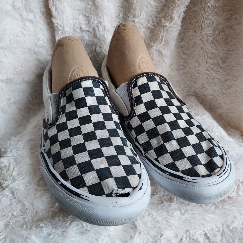 Vans Black and White Checkered Slip Ons